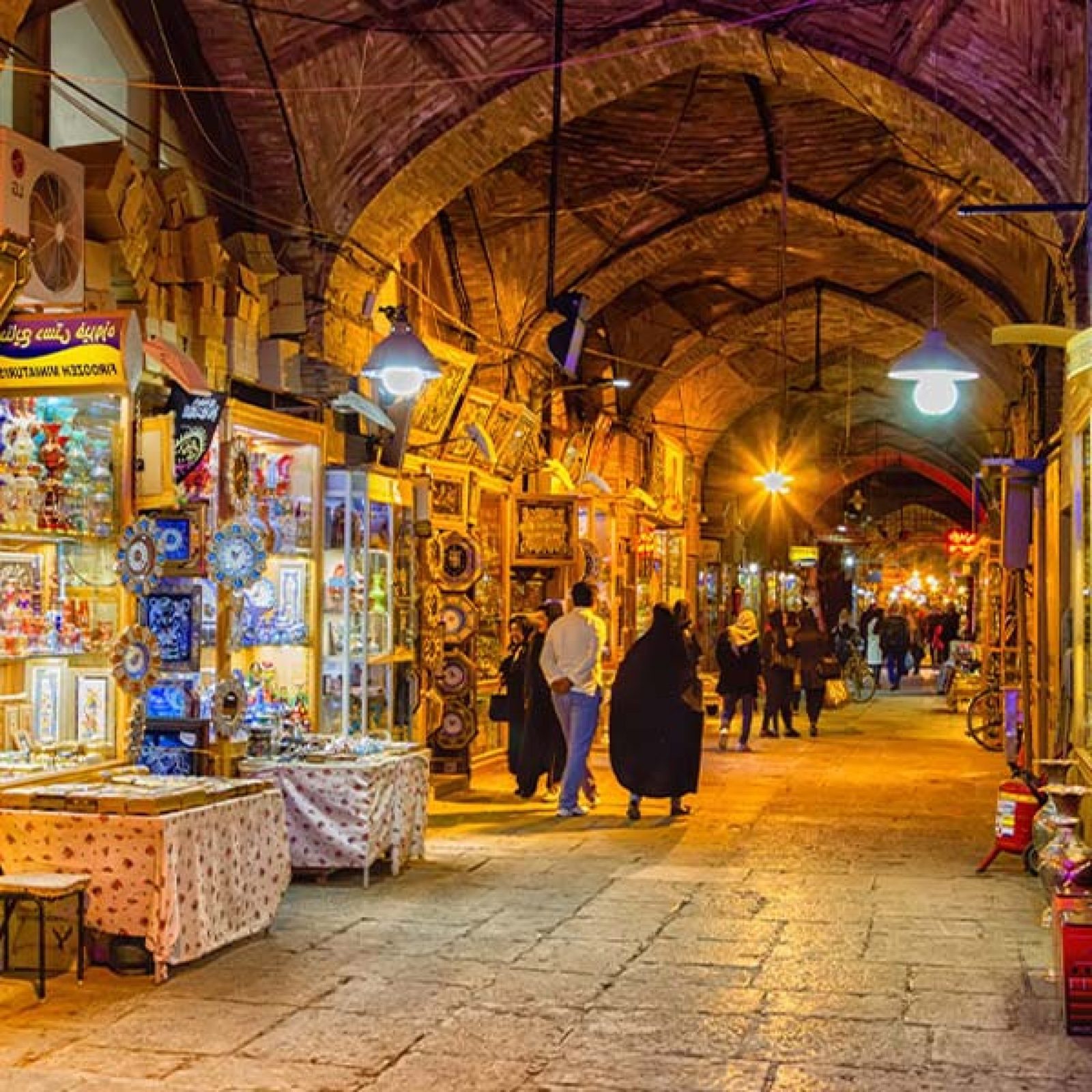 Lantern-lit alley of the Isfahan Grand Bazaar